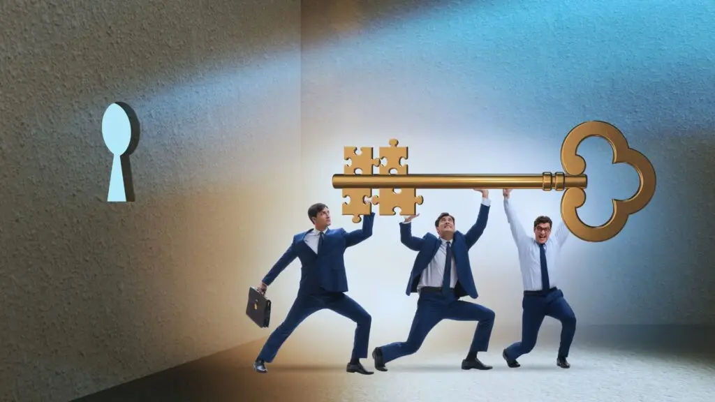 Three businessmen carrying a giant golden key towards a puzzle-shaped keyhole, representing teamwork in solving complex problems