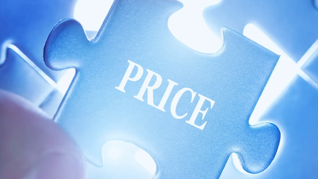 A close-up of a blue puzzle piece with "PRICE" written on it in white, symbolizing TeamGantt Pricing, being fitted into a puzzle with a glowing background.