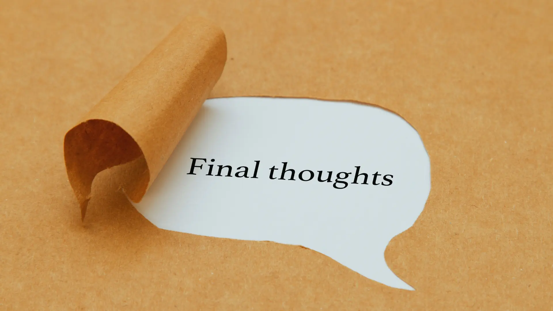 A piece of brown paper is peeled back, revealing the words "Final thoughts" typed on a white speech bubble underneath—perfect for reflecting on On-Time Project Management insights.