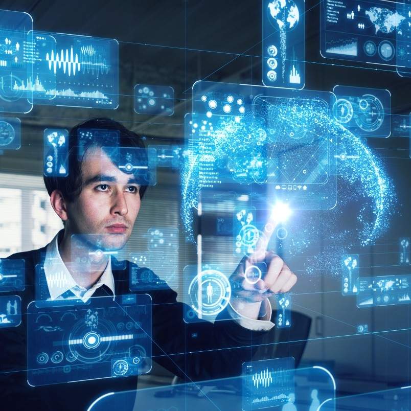 A man in a suit interacts with futuristic digital interfaces and holographic data displays, as if discovering how to write an epic through virtual screens featuring charts, graphs, and a glowing 3D globe.