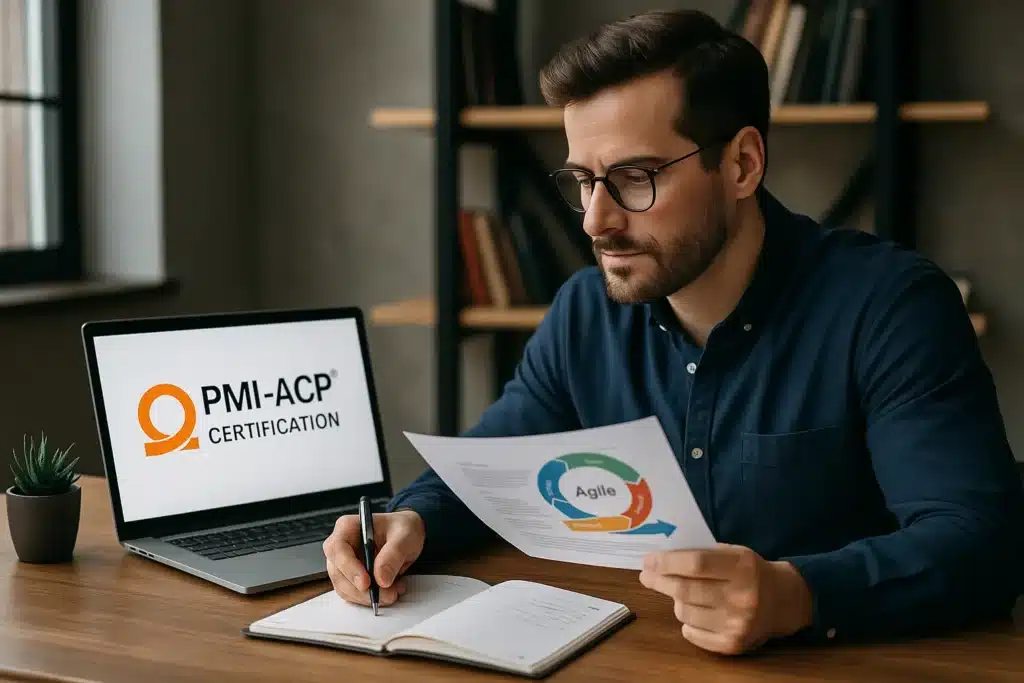 A man wearing glasses studies agile methodology documents at a desk, with a laptop displaying "PMI-ACP Certification" and a notebook open for taking notes as he prepares for his PMI-ACP Certification exam.