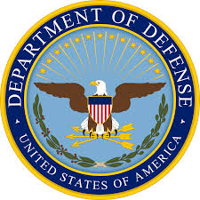 The official seal of the U.S. Department of Defense, featuring a bald eagle with a shield, olive branch, and arrows, surrounded by a blue ring with the text "Department of Defense United States of America.
