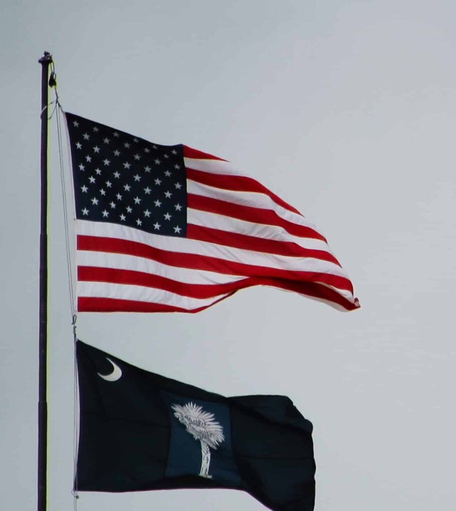 US and South Carolina flags in Rock Hill, SC, highlighting ROSEMET’s local project management training availability for the community.
