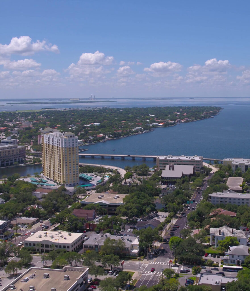 Aerial view of downtown Tampa and the bay; start PMP® or CAPM® training with free 7-day access, live office hours, and 1-on-1 coaching.