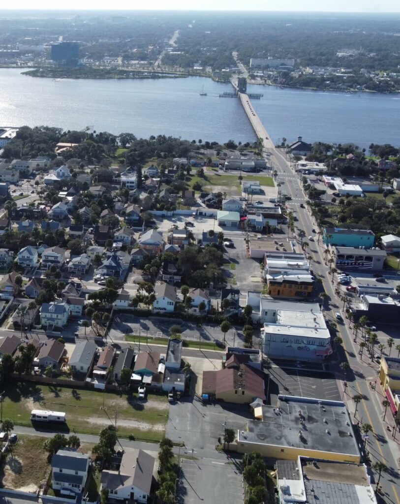 Aerial view of Daytona Beach bridges; get free 7-day access to PMP® and CAPM® certification training with on-demand lessons and 1-on-1 coaching.